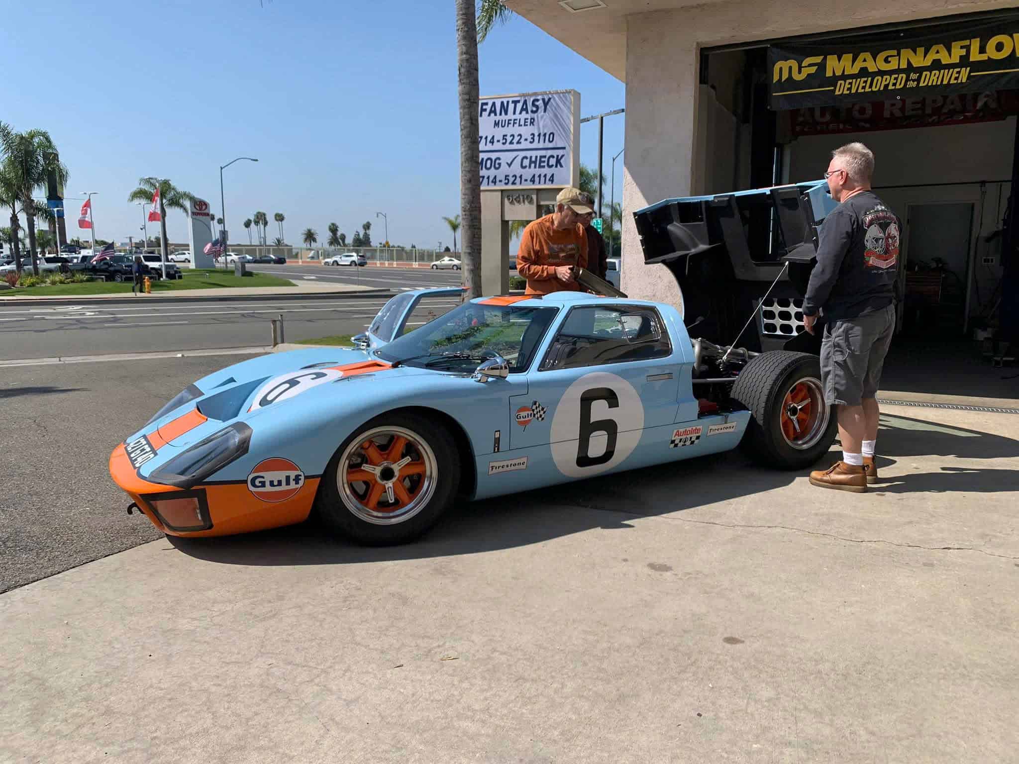 Classic race car at Vu & Vu Smog Check Test Only Center for vehicle emissions testing.